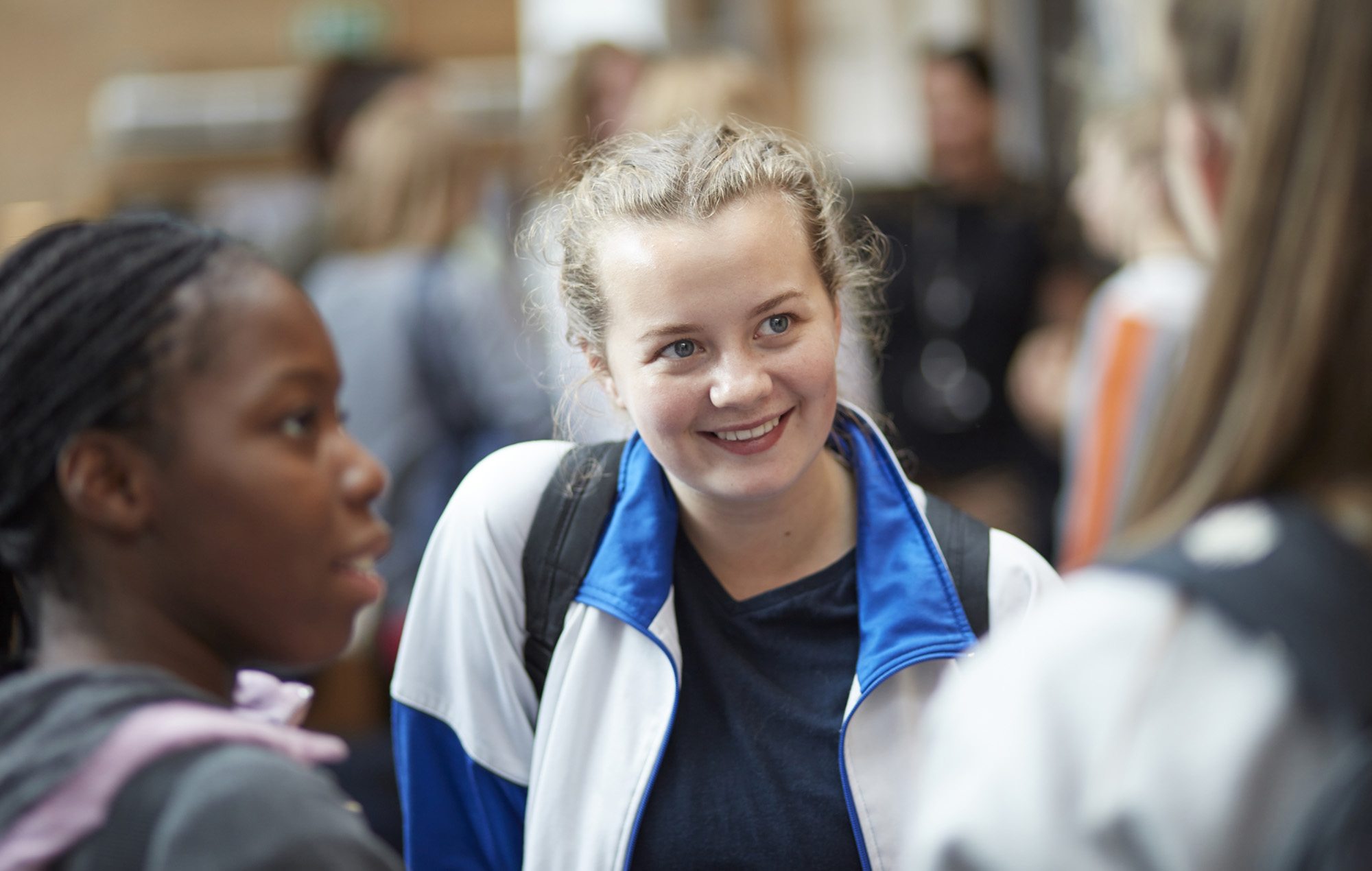 Happy students chatting on a break